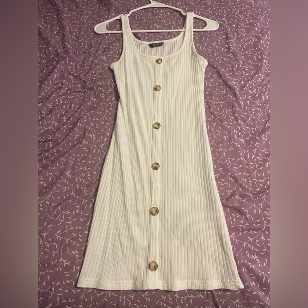 Small white dress , with fake buttons